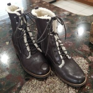 Beautiful brown with cream faux fur. Never worn!!